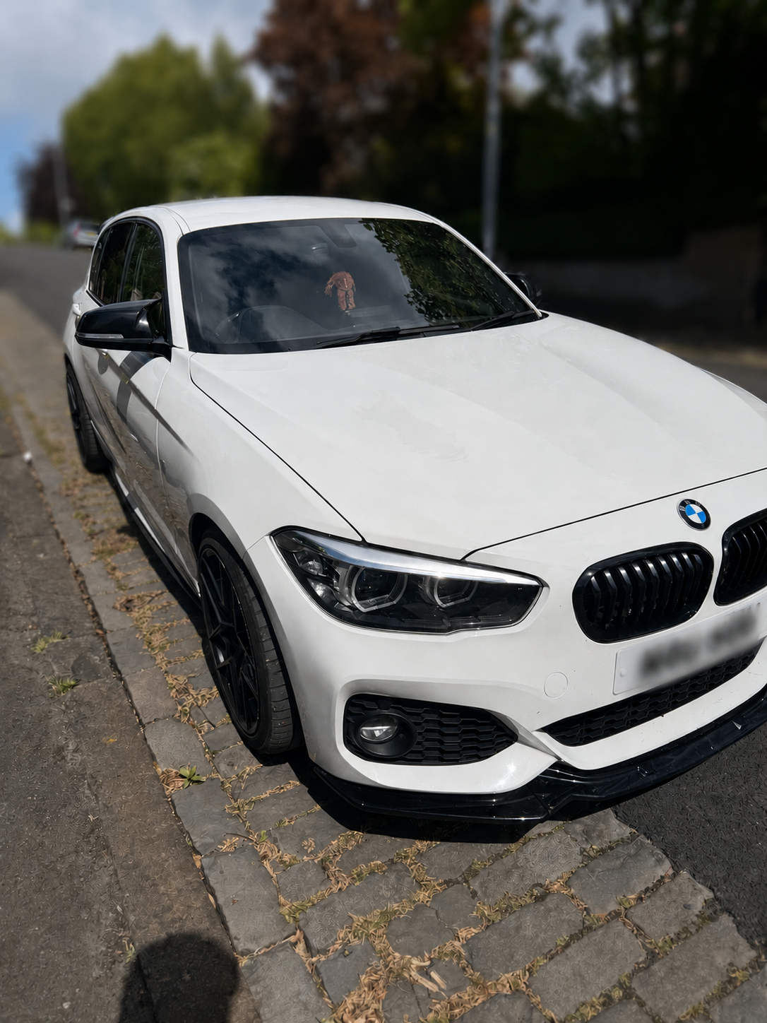 White BMW back on the road after repair